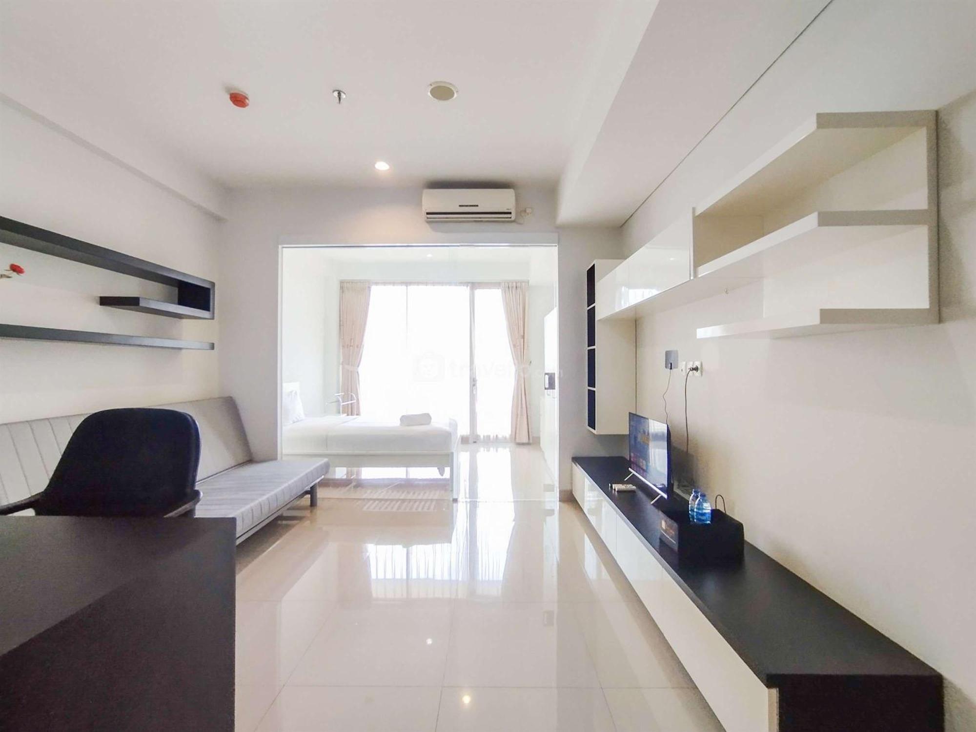 Apartemen And Comfy 1br At Dago By Travelio